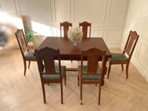 Extendable table set with 6 chairs, blue fabric cushions, European craftsmanship, sourced from Germany.