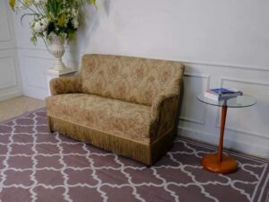 2 seat sofa, wooden frame, fabric cushion, cream color, floral pattern. European work comes from Germany.