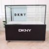 Jewelry cabinet, glass cabinet to display products Rectangular shape, 2 sliding glass doors, black base, has 2 sliding doors for storage.