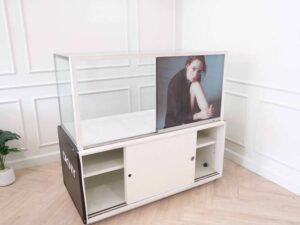 Jewelry cabinet, glass cabinet to display products Rectangular shape, 2 sliding glass doors, black base, has 2 sliding doors for storage.