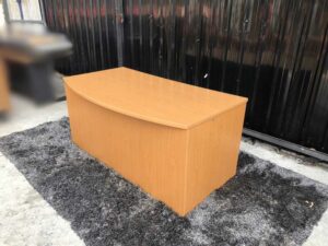 Executive desk With keyboard rail, wooden frame, cream color.