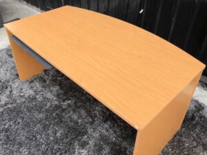 Executive desk With keyboard rail, wooden frame, cream color.