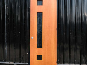 Wooden door with 3 glass panel mullions There is a shock absorber to slow down opening and closing, Soft Close system.