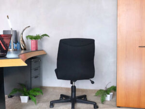 Office chair, rockworth chair, thick black fabric cushion.