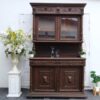 Buffet cabinet, carved wood, walnut color, European work from Germany.