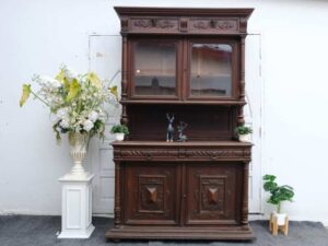 Buffet cabinet, carved wood, walnut color, European work from Germany.