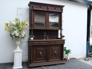 Buffet cabinet, carved wood, walnut color, European work from Germany.