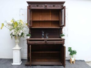 Buffet cabinet, carved wood, walnut color, European work from Germany.