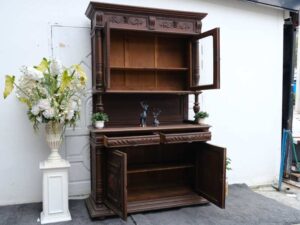 Buffet cabinet, carved wood, walnut color, European work from Germany.