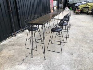 Tall bar table and chairs, black steel frame, wooden top.