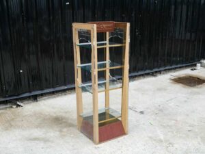 Product shelf Product display shelf, 4 glass shelves, brown wooden frame.