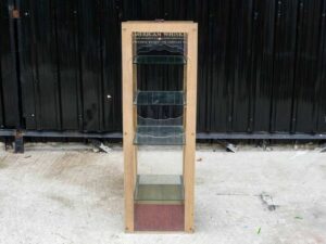 Product shelf Product display shelf, 4 glass shelves, brown wooden frame.