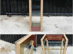 Product shelf Product display shelf, 4 glass shelves, brown wooden frame.