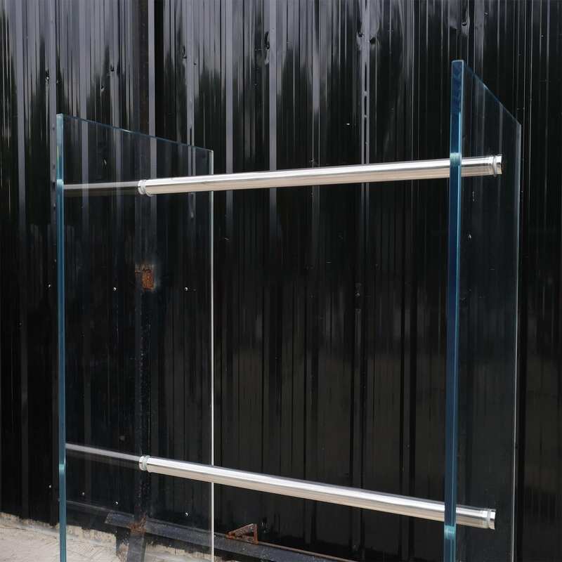 Product hanging rack Product hanging shelf, glass walls on 2 sides, 3 hanging rails, cream colored wooden base.