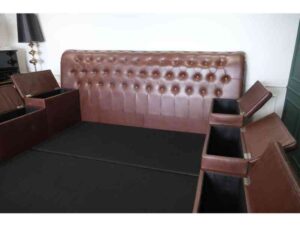King size bed covered in brown leather There are 8 storage compartments