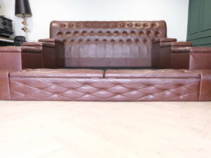 King size bed covered in brown leather There are 8 storage compartments