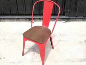 Red steel frame chair with wooden cushion