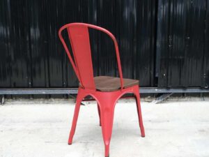 Red steel frame chair with wooden cushion