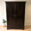 Wooden wardrobe with 2 opening doors, European workmanship, sourced from Germany.