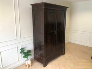 Wooden wardrobe with 2 opening doors, European workmanship, sourced from Germany.