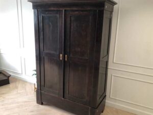Wooden wardrobe with 2 opening doors, European workmanship, sourced from Germany.