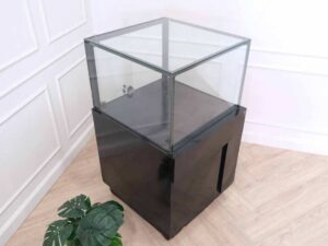 Jewelry cabinet, glass cabinet to display products Square shape, black wooden base, has 2 storage cabinets that open.