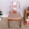 Wooden chair, patterned fabric cushion, beautiful frame.