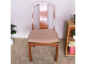 Wooden chair, patterned fabric cushion, beautiful frame.