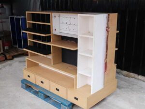 Product shelves, 2 sides, brown wooden frame. The bottom has 4 storage drawers on each side.