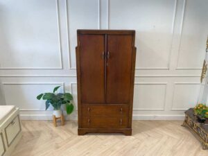 Wooden wardrobe with 2 doors, wooden frame, brown color.
