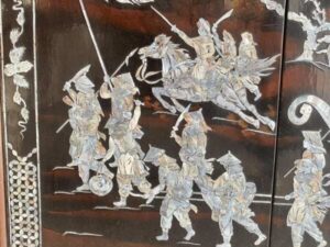 Pictures of ancient warriors inlaid with pearls