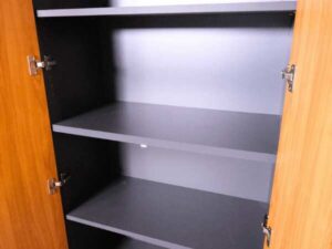 Tall file cabinet with 2 doors, Rockworth brand.