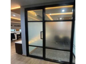 Glass door, blackened aluminum frame