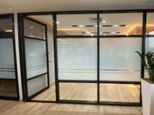Glass door, blackened aluminum frame