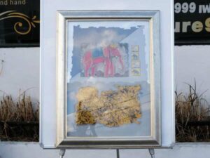 Picture of elephant and forest, silver frame
