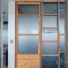 Wooden door with glass window (no key / no door closer)