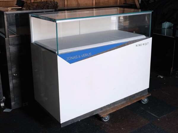 Jewelry cabinet, glass cabinet to display products Rectangular shape glass door open White wooden base with blue stripes