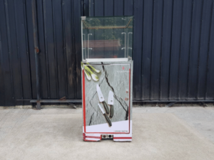 Jewelry cabinet, glass cabinet to display products Tall, square shape glass door open Gray stone pattern wood base