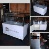 Jewelry cabinet, glass cabinet to display products Rectangular shape glass door open White wooden base with black trim