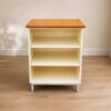Cream colored 3tier TV stand with wooden top and metal legs