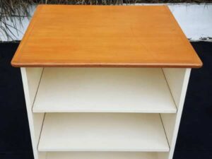 Cream colored 3tier TV stand with wooden top and metal legs