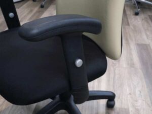 office chair Cream leather backrest, black cloth cushion, with arms.