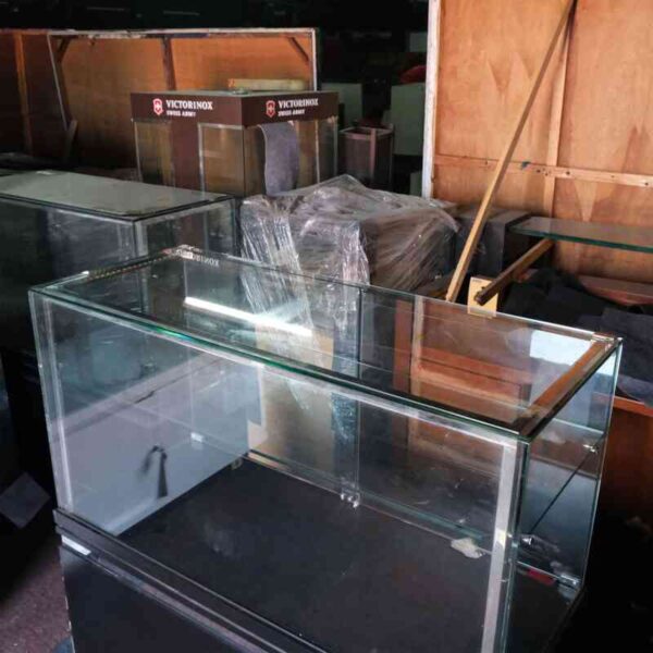 Jewelry cabinet, glass cabinet to display products Rectangular shape glass door open Black wooden base with silver trim