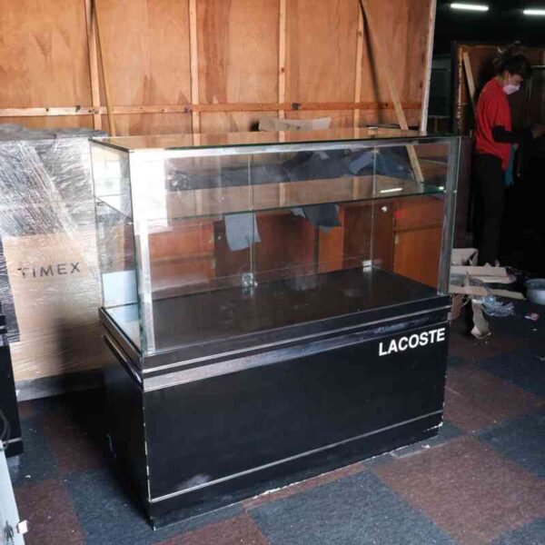 Jewelry cabinet, glass cabinet to display products Rectangular shape glass door open Black wooden base with silver trim