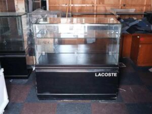 Jewelry cabinet, glass cabinet to display products Rectangular shape glass door open Black wooden base with silver trim