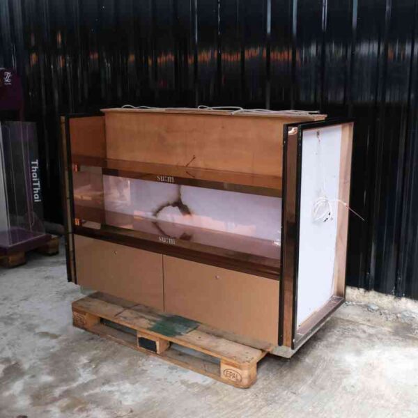 Product shelves, 2 sides, 2 shelves on each side, 2 drawers, wooden frame with gold stainless steel edges. There is a light sign on the side.