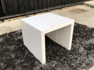 Center table, minimalist style, wooden frame, white.