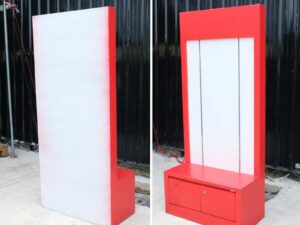 Tall wooden product shelf, open front, red-white wooden frame, has 2 storage drawers.