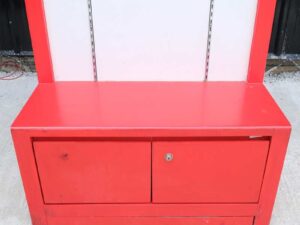 Tall wooden product shelf, open front, red-white wooden frame, has 2 storage drawers.
