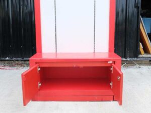 Tall wooden product shelf, open front, red-white wooden frame, has 2 storage drawers.